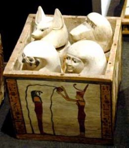 Canopic chest of priest of Montu Pady-Imenet. Neith pouring water on Qebehsenuef, the son of Horus who protected the intestines. XXII Dynasty. Luxor Museum. Photo: www.ancient-egypt.co.uk