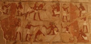Egyptian artist working as a team in the manufacturing of statues. Relief from the tomb of Rekhmire in Luxor. Photo Mª Rosa Valdesogo. Art in Ancient Egypt.